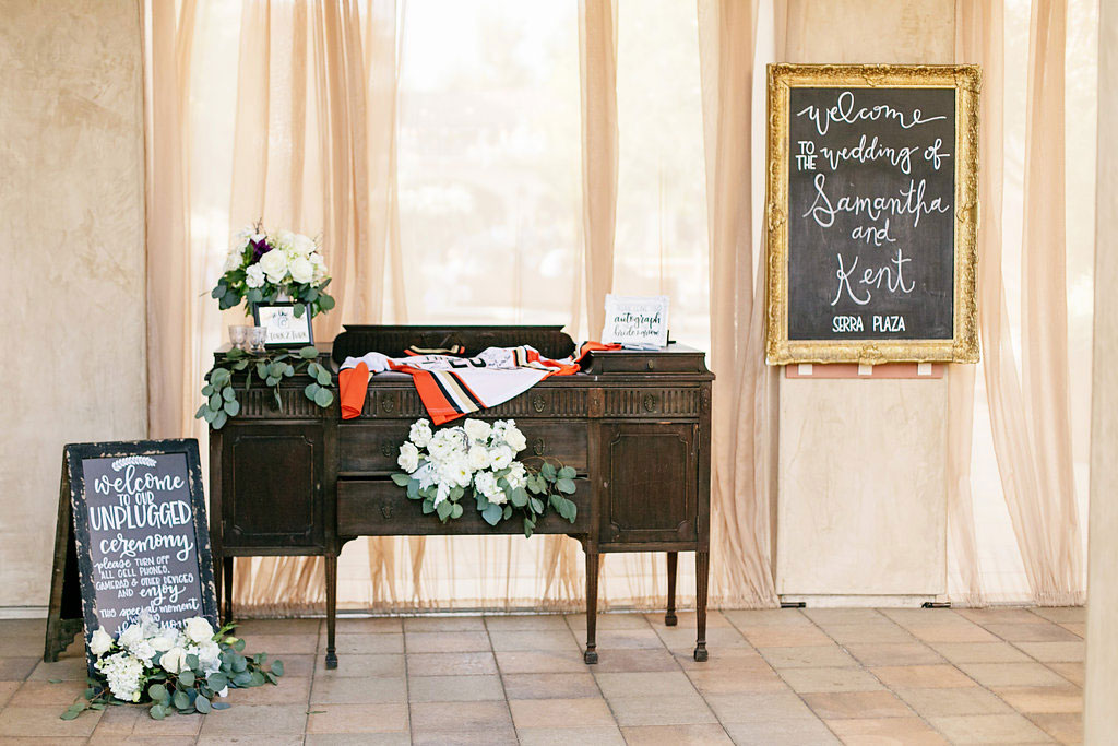 Wedding sign in table with custom Anaheim Ducks jersey to sign