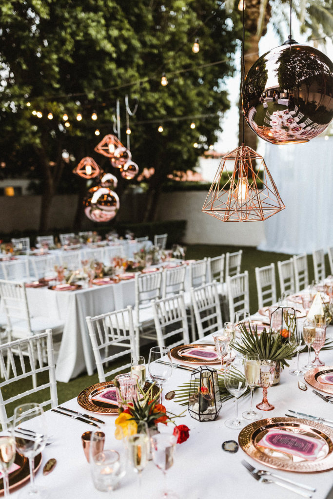 Avalon Palm Springs Wedding Reception with copper lanterns and copper table settings.