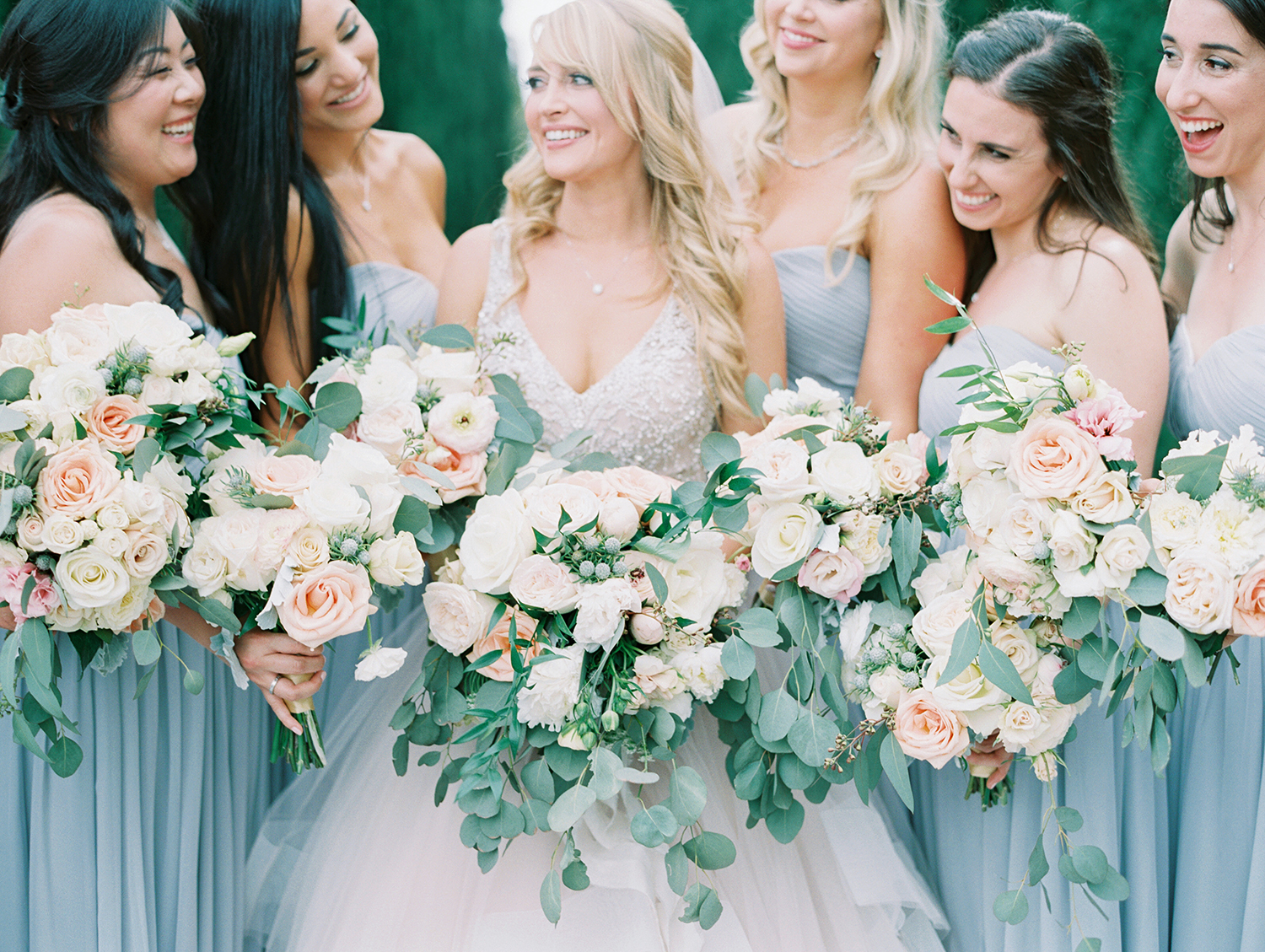 Gloriana and Eric's Wedding at The Greystone Mansion with light blue dresses and eucalyptus bouquets