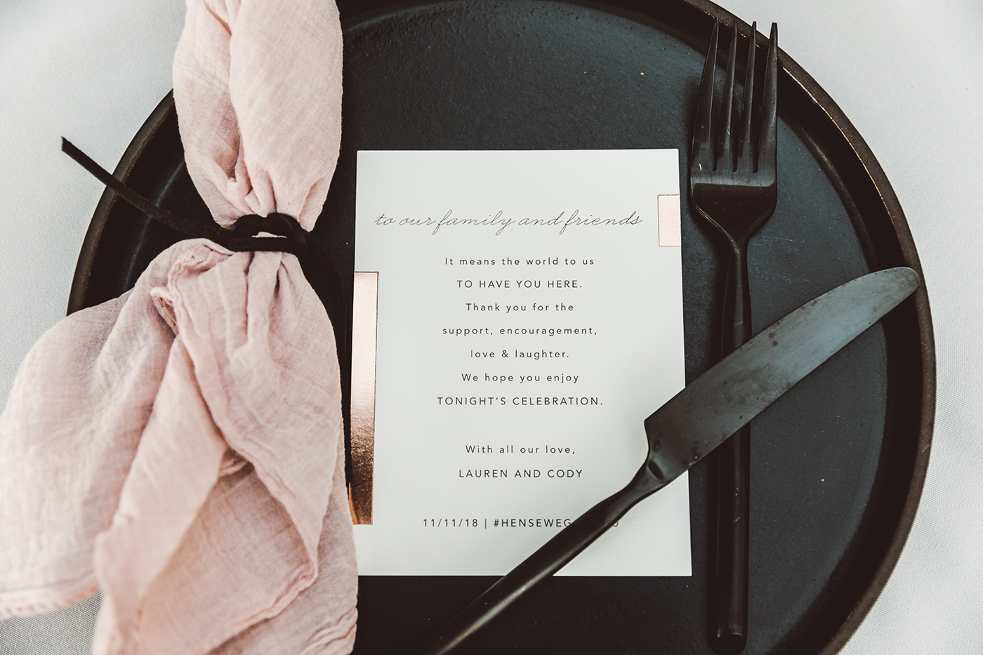 Pink and black table setting